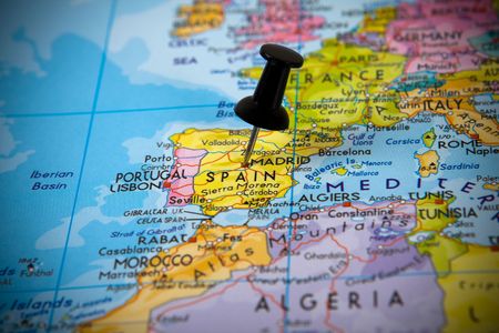 Small pin pointing on Madrid (Spain) in a map of Europeの写真素材