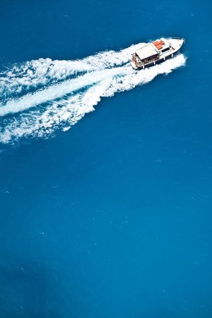 Boats on sea - top view with a lot of blue copy spaceの写真素材