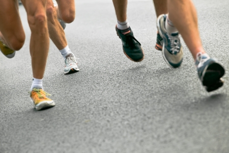 People running in city marathonの写真素材