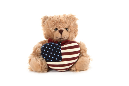 Fluffy teddy bear isolated on white の写真素材