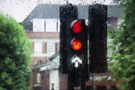 London views through the glass with raindrops