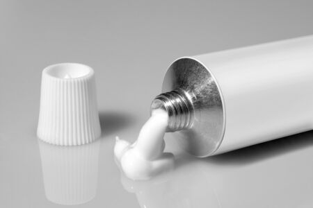 tube of white color on a gray backgroundの写真素材