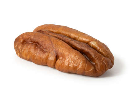 Half a pecan kernel on white background. Full depth of field. With clipping path