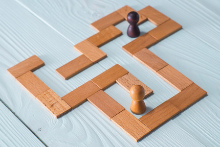 Two people inside the Maze. The concept of a business strategy, analytics, search for solutions, the search output.の写真素材