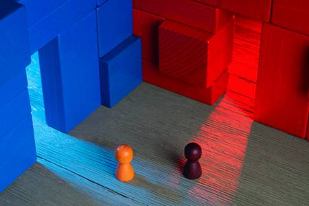 Choice concept. Two abstract business persons and two doors, blue and red, doubtful. The man hesitates before choosing. Business Mans standing in front of two doors, unable to make the right decision.の写真素材