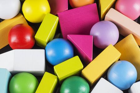 Abstract Background. Background with different colorful shapes wooden blocks. Geometric shapes in different colors. Concept of creative, logical thinking.の写真素材