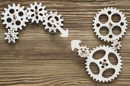 Gear wheels on wooden background. The concept of creative, logical thinking. Logic background. の写真素材