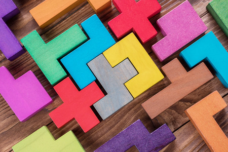 Geometric shapes on a wooden background.の写真素材