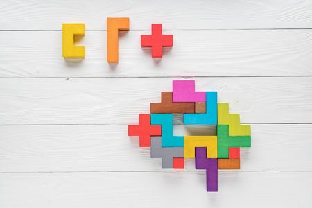 Human brain is made of multi-colored wooden blocks.の写真素材