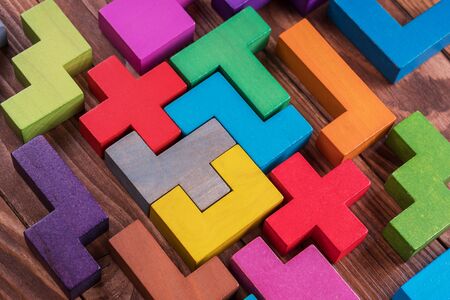 Geometric shapes on a wooden background.の写真素材