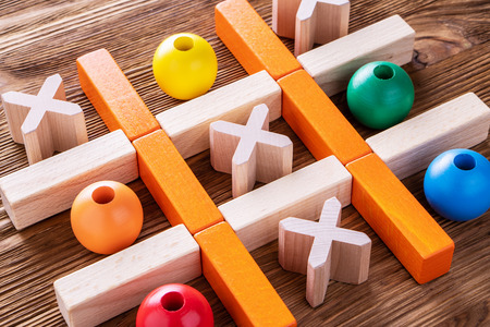 Wooden  tic tac toe (OX) game., The concept of strategy, risk, competition in business.の写真素材