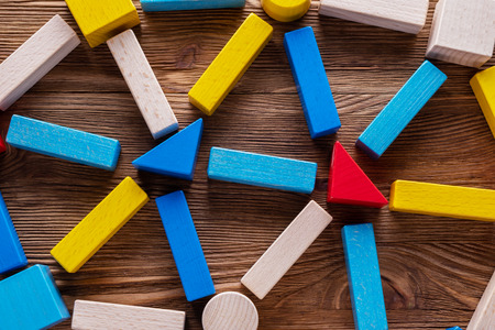 Abstract Background. Background with different colorful shapes wooden blocks . Geometric shapes in different colors. Concept of creative, logical thinking.の写真素材