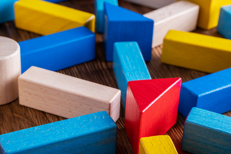 Abstract Background. Background with different colorful shapes wooden blocks . Geometric shapes in different colors. Concept of creative, logical thinking.の写真素材