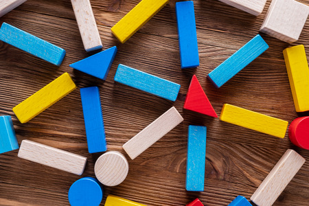 Abstract Background. Background with different colorful shapes wooden blocks . Geometric shapes in different colors. Concept of creative, logical thinking.の写真素材