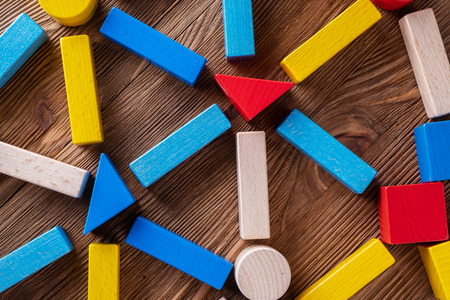 Abstract Background. Background with different colorful shapes wooden blocks . Geometric shapes in different colors. Concept of creative, logical thinking.の写真素材