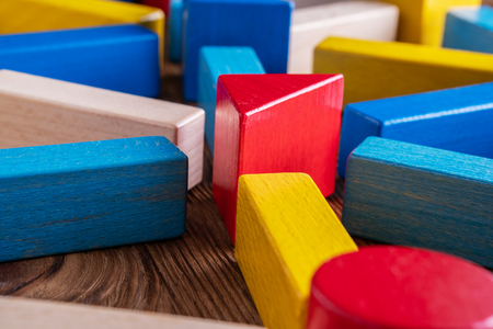 Abstract Background. Background with different colorful shapes wooden blocks . Geometric shapes in different colors. Concept of creative, logical thinking.の写真素材