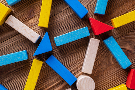 Abstract Background. Background with different colorful shapes wooden blocks . Geometric shapes in different colors. Concept of creative, logical thinking.の写真素材
