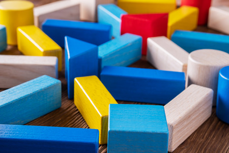 Abstract Background. Background with different colorful shapes wooden blocks . Geometric shapes in different colors. Concept of creative, logical thinking.の写真素材
