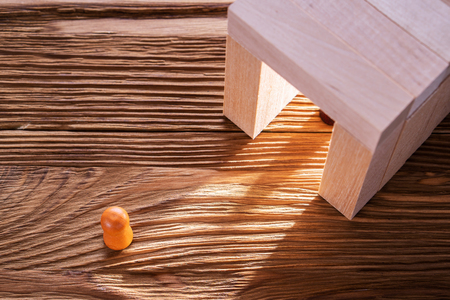 Abstract man into the wooden corridor with copy space. Concept of success. Abstract man in a wooden tunnel.の写真素材