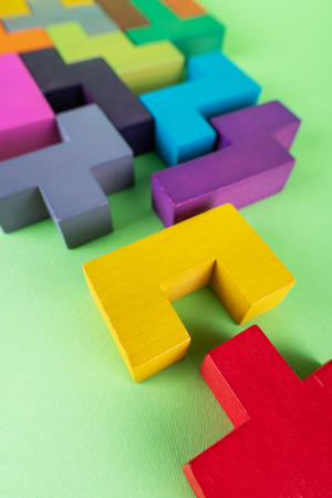 The concept of logical thinking. Geometric shapes on a wooden background.の写真素材