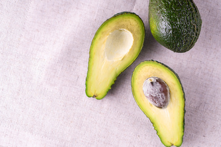 Ripe avocado. Healthy food concept.