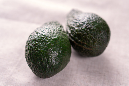 Ripe avocado. Healthy food concept.
