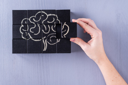 The concept of the human brain. Education, science and medical concept.  Brain drawn in chalk on...