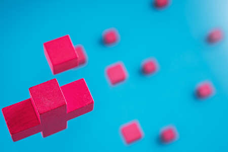 Pink cubes on light blue background.の写真素材