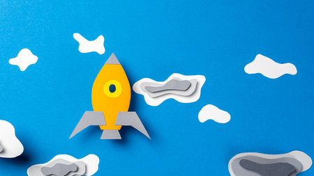 startup idea. Rocket launch, ship. Rocket flight through the cloudsの写真素材