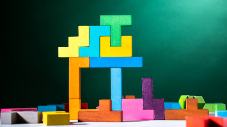 Geometric shapes on a green background. colorful wooden blocksの写真素材