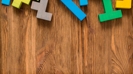 Geometric shapes on a brown wooden background.の写真素材