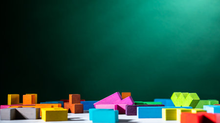 Geometric shapes on a green background. colorful wooden blocksの写真素材