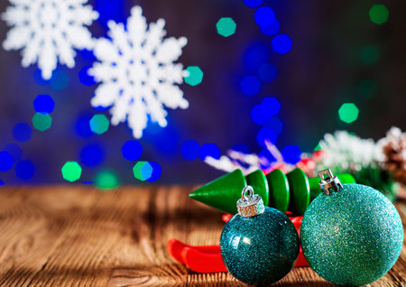 The template for Christmas greetings card with green christmas balls and white snowflakes. Xmas baubles. Merry christmas background. new year still life.の写真素材