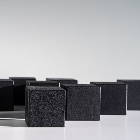 Abstract construction from black wooden blocksの写真素材