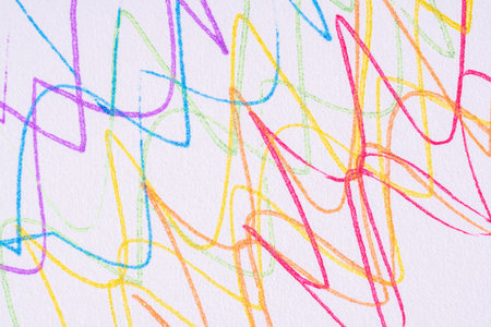Colorful pencils on white paper texture. Abstract background for design.の写真素材