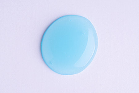 Transparent blue cosmetic sample texture with bubbles. Cosmetic peeling gel. Cosmetic blue peeling gel, beauty texture backgroundの写真素材