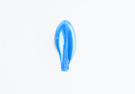 Blue nail polish swatches isolated on white background. Light blue nail polish samplesの写真素材