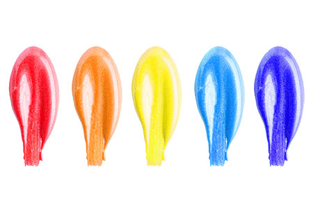 Collection of various nail polish swatches isolated on white background. Rainbow nail polish samplesの写真素材