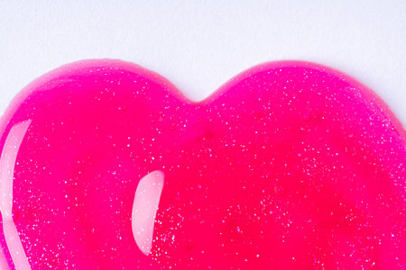 Pink shower gel on white background, macro textureの写真素材