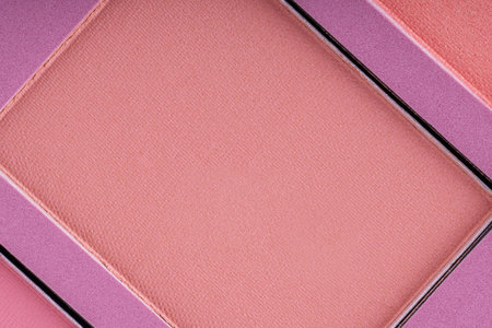 Pressed eyeshadow or blush texture. Macro shiny cosmetic makeup productの写真素材
