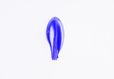 Dark blue nail polish swatches isolated on white background. Indigo nail polish samplesの写真素材