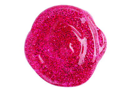 Round swatch of dark pink shimmer lip gloss, nail polish, cosmetics product or paint isolated on white background. Deep red glitter swatch of lip gloss, cosmetic product stroke or paint.の写真素材