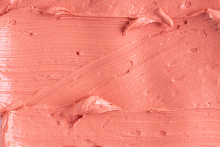 Orange clay mask texture. Clay mask cream for the face and body. SPA backgroundの写真素材
