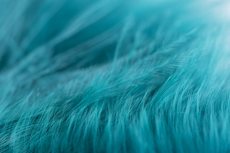 Green turquoise feathers in soft and blur style for background, macro shot. Green turquoise and blue color trends feather texture backgroundの写真素材
