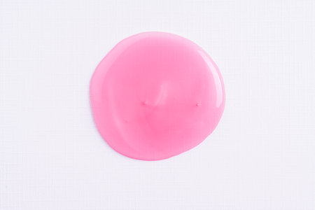 Transparent pink cosmetic sample texture with bubbles.の写真素材