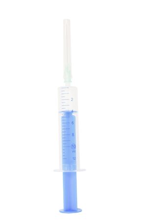 Syringe and needle isolated on a white backgroundの写真素材