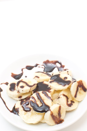 slices of banana with chocolateの写真素材