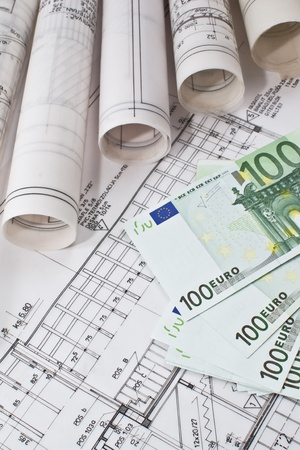 Architectural project  blueprints and euro money real estate conceptの写真素材