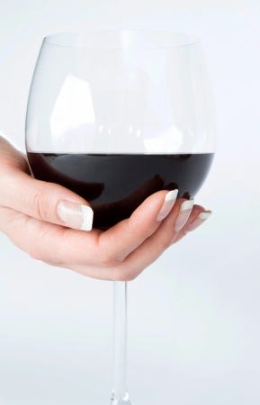Woman holding a wine glassの写真素材