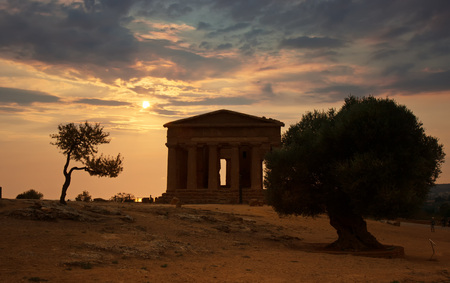 Sunset over the Temple of Concordia, Agrigento,  Sicily in Italy の写真素材